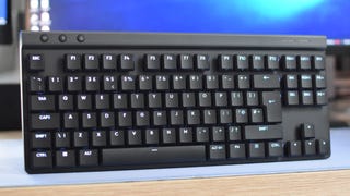 The Logitech G515 Lightspeed TKL gaming keyboard, propped upright on a desk.