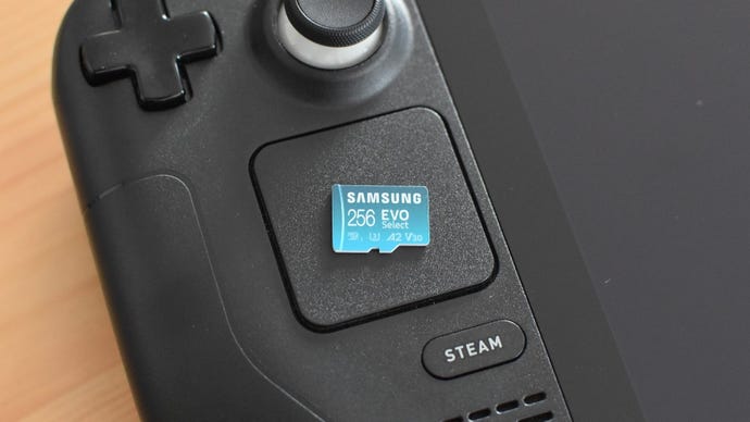 The Samsung Evo Select microSD card on top of a Steam Deck.