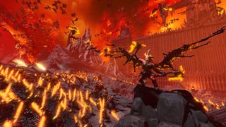 A red demon roars as his army charges forward in Total War: Warhammer 3